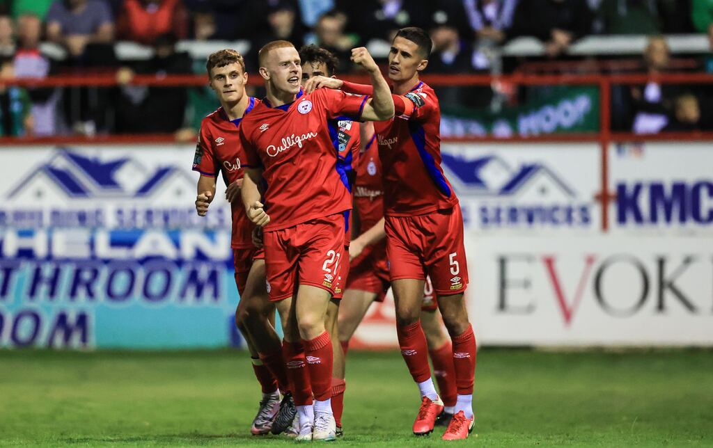 Shelbourne's Gavin Molloy celebrates scoring his last minute equaliser with teammates. Photograph: ©INPHO/Evan Treacy