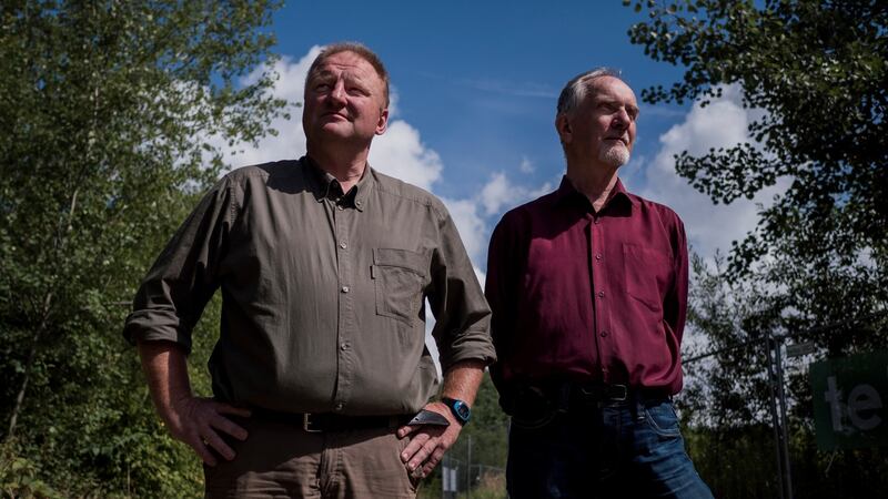Treasure hunters Piotr Koper (left) and Adam Szynkiewicz, near the area where their search is under way for a Nazi train in Walbrzych, Poland. Photograph: Mikolaj Nowacki/The New York Times