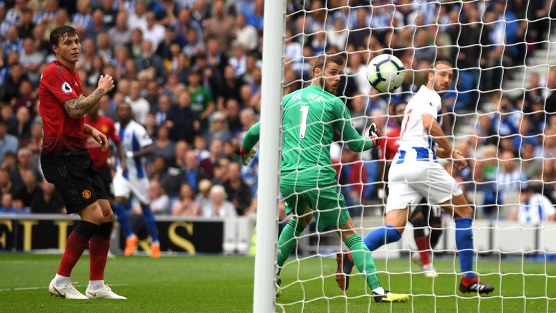 Glenn Murray opens the scoring for Brighton against Manchester United. Photograph: Mike Hewitt/Getty