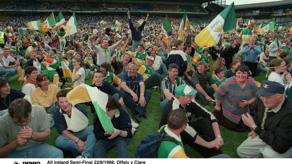 Offaly fans stage a sit-down protest on the pitch after referee Jimmy Cooney mistakenly ended the game three minutes before full time. Photograph: James Meehan/Inpho