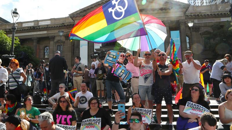 Celebrations begin outside the State library of Victoria for the outcome of the Same Sex Marriage vote, Melbourne. Photograph: EPA