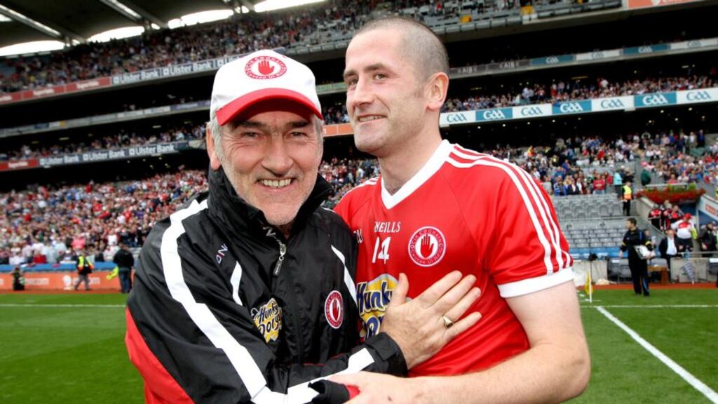Tyrone manager Mickey Harte congratulates Stephen O’Neill following the victory over Monaghan at Croke Park. Photograph: Ryan Byrne/Inpho