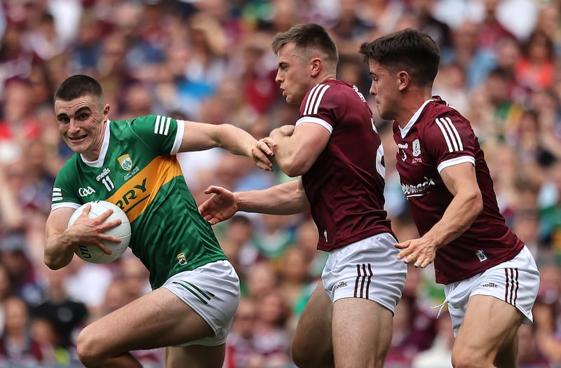 Kerry's Seán O'Shea and John Daly of Galway in Sunday's memorable All-Ireland final. Photograph: Inpho