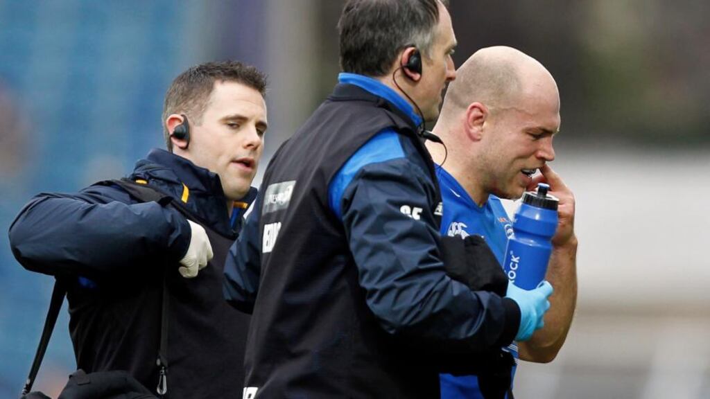 Leinster’s Richardt Strauss goes off with a suspected head injury against the Dragons. Photograph: Colm O’Neill/Inpho