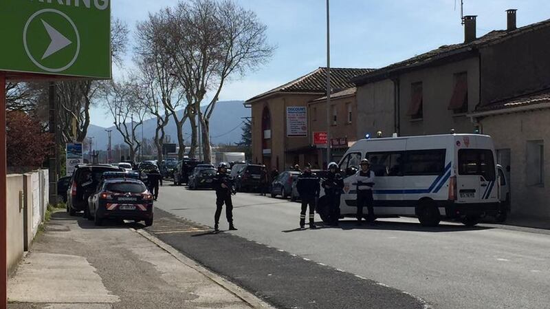 Police at the scene of a hostage situation in a supermarket in Trebes. Photograph: La Vie A Trebes/via Reuters