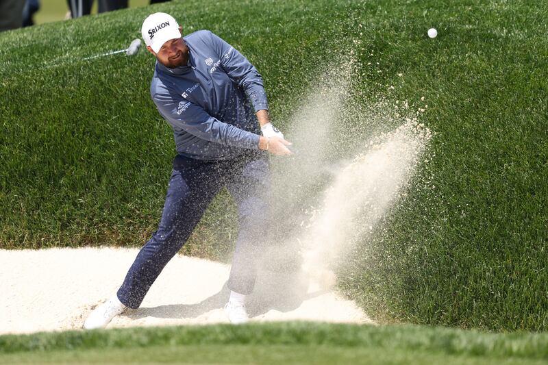 Shane Lowry plays a shot from a greenside bunker on the 17th hole during the first round of the 2023 US PGA Championship at Oak Hill Country Club in Rochester, New York. Photograph: Warren Little/Getty Images