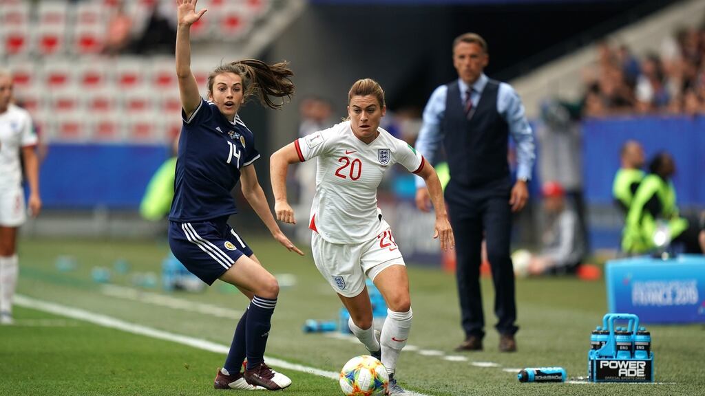 Scotland’s Chloe Arthur (left) and England’s Karen Carney (right) battle for the ball during the World Cup. Photograph: John Walton/PA