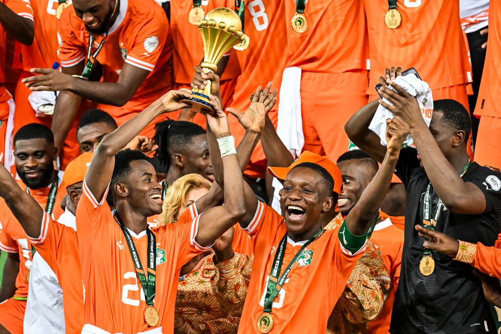 Ivory Coast lifting the Africa Cup of Nations trophy after defeating Nigeria at the Olympic Stadium of Ebimpe in Abidjan, Ivory Coast, on Sunday. Photograph: Sia Kambou/AFP