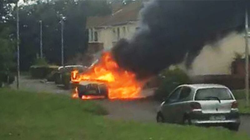 The vehicle suspected of being used in the shooting seen in flames later in Elm Way, Lucan. Photograph: Chris Brady
