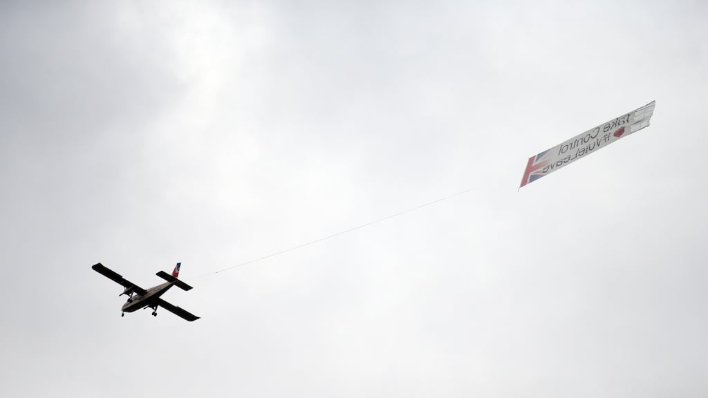 A plane carrying a banner with the words ‘Take Control #VoteLeave’ emblazoned on it flies above London’s Trafalgar Square during a rally in tribute to Labour MP Jo Cox. Photograph: Daniel Leal-Olivas/PA Wire