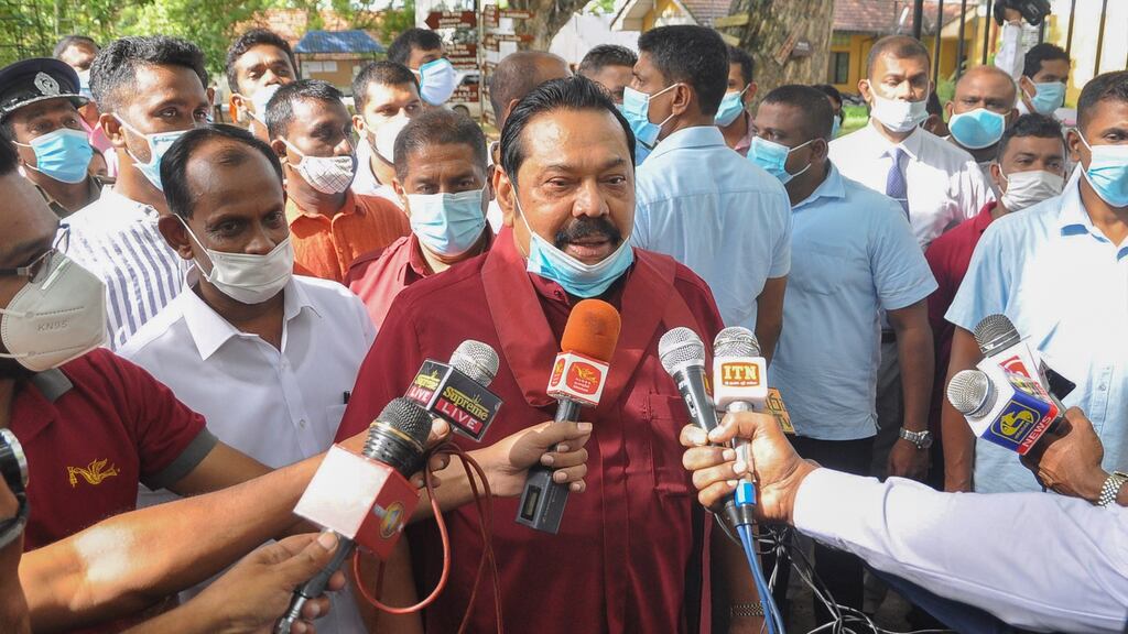 Sri Lankan prime minister Mahinda Rajapaksa leaves a polling station after casting his vote in the country’s parliamentary elections  in Tangalla. Photograph: EPA/STR