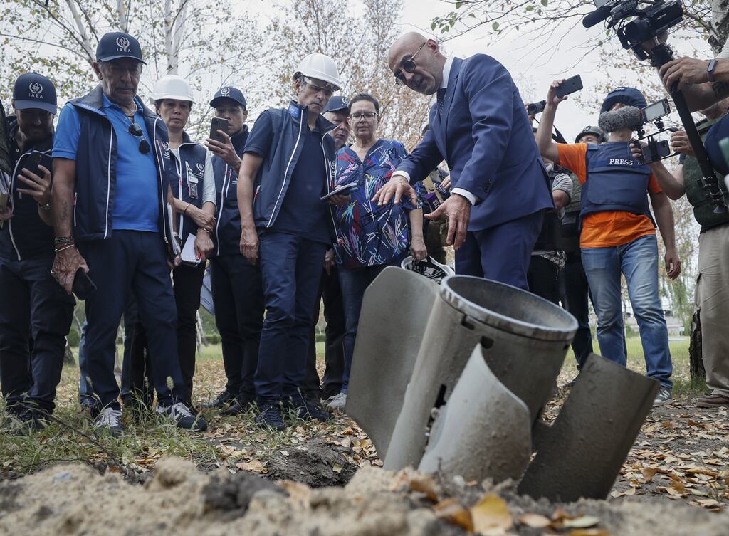 International Atomic Energy Agency head Rafael Grossi (C) and team members at the Zaporizhzhia Nuclear Power Plant. Photograph: EPA