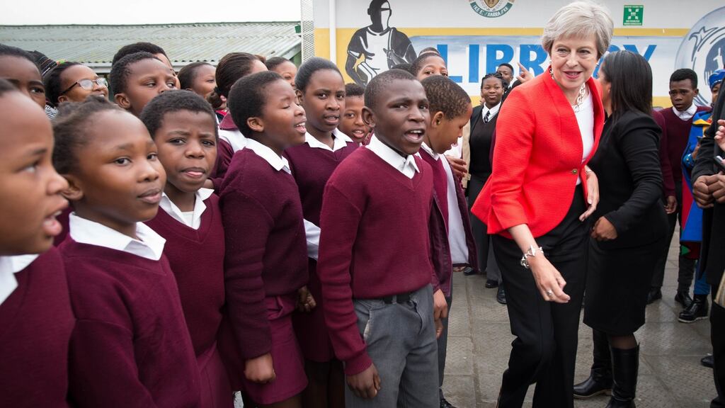 Theresa May dancing in Cape Town. Photograph: Stefan Rousseau/PA