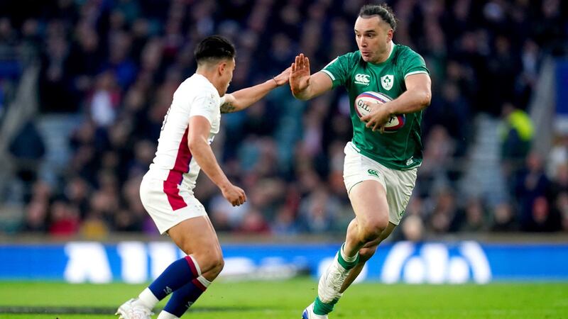 Ireland’s James Lowe looks to hold off the tackle of England’s Marcus Smith during the Guinness Six Nations match at Twickenham. Photograph: David Davies/PA Wire