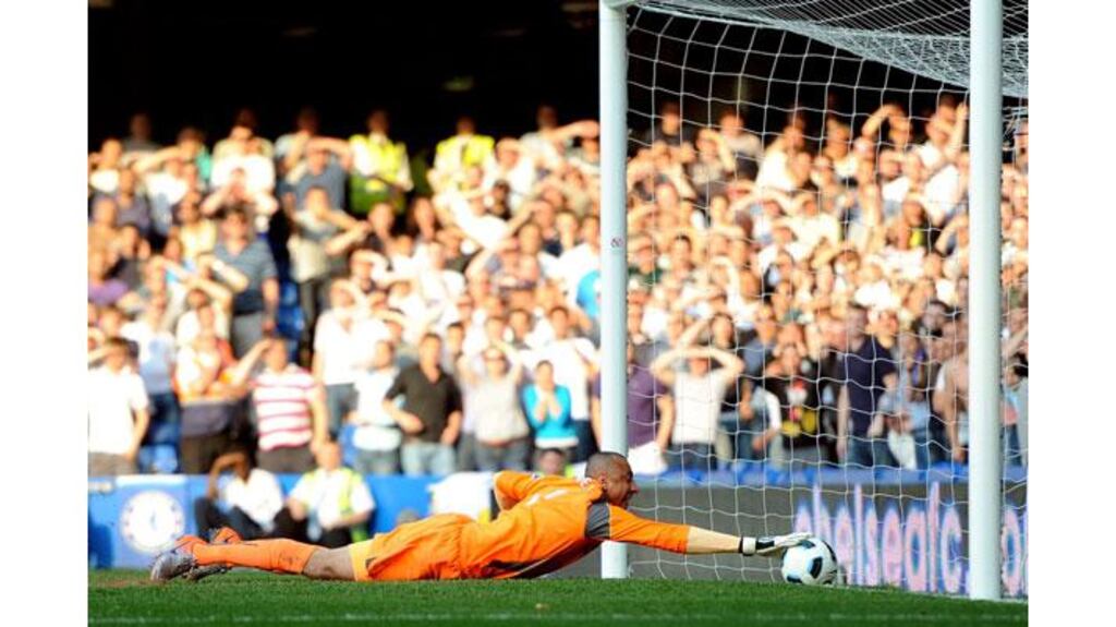 Tottenham Hotspur's goalkeeper Heurelho Gomes attempts to prevent Chelsea's Frank Lampard's shot from crossing the line during their Premier League match at Stamford Bridge. The goal was awarded. Photograph: Russell Cheyne/Reuters