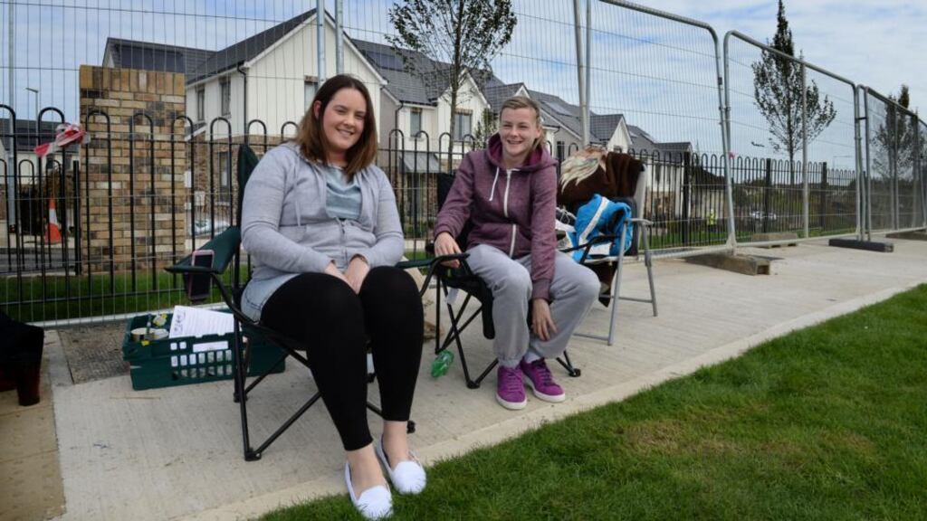 Megan O’Shaughnessy (left) and Shantelle Farrell are the first and second in queue respectively to buy houses at the Millers Glen housing development, in Swords, Co. Dublin, when the properties go on sale on Saturday. Photograph: Dara Mac Dónaill/The Irish Times.