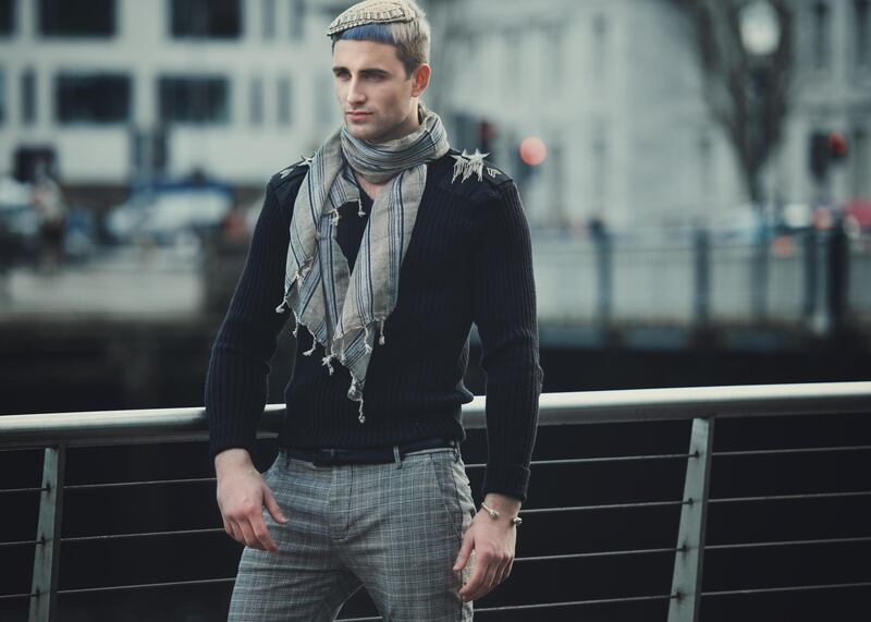 Check trousers €48, white trainers €59 and cuff €15 all from Topman. Vintage jumper €30, Records & Relics. Star brooches worn as shoulder decor €15 each at Moda Mallow, Cork. Vintage headpiece €65 and retro sunnies €20, The Hummingbird Rooms, Cork. Scarf €50 from Salingers, Cork