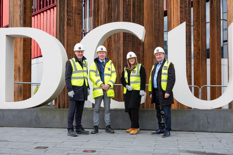 Ciaran Moody of Mitsubishi Electric, Alan Mangan estate manager at DCU, Margaret Rafter, Mitsubishi Electric and Stephen Walsh, JV Tierney & Co, outside the new Polaris building at DCU, Collins Avenue in Dublin