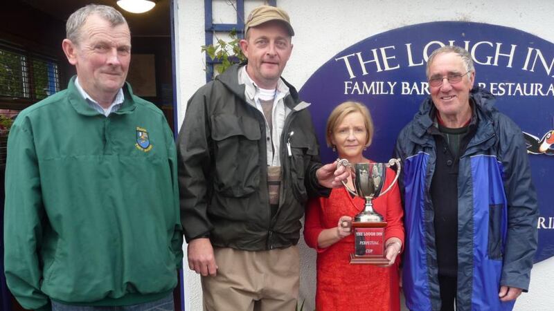 Partry winners David Bohanna and Shay Cash with Rosaleen Ward (Lough Inn) and Vincent Horan (club chairman, left).