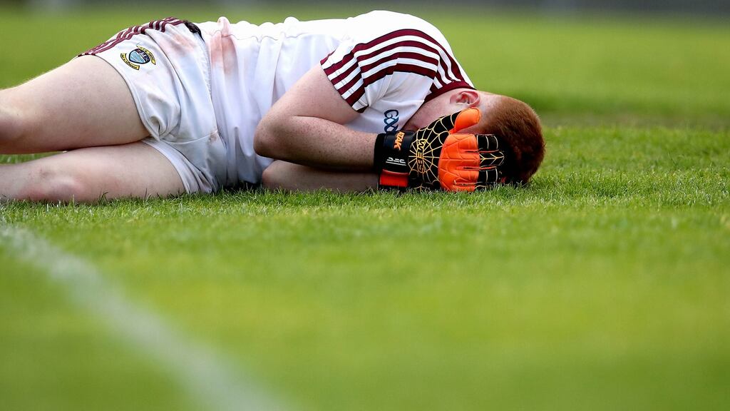 Westmeath goalkeeper Kevin Fagan can’t hide his disappointment after spilling the ball into his own goal. Photograph: Ryan Byrne/Inpho