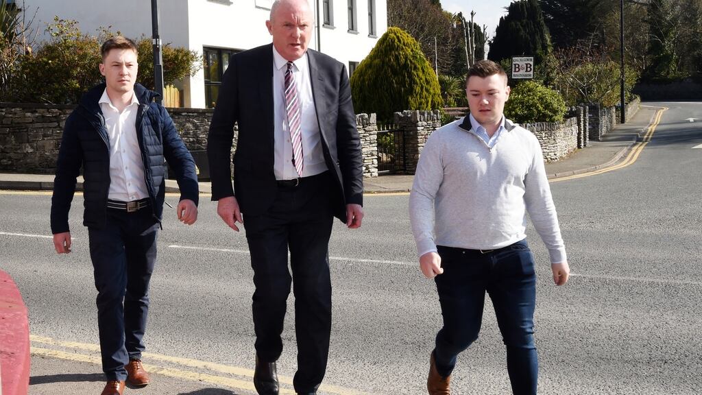 Brothers Kevin and Jackie Healy-Rae arrive with their solicitor Pádraig O’Connell at Kenmare District Cout on Friday. Photograph: Michelle Cooper Galvin