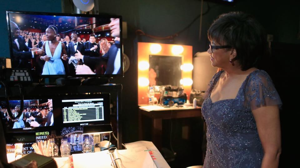 Behind the scenes: Oscars president Cheryl Boone Isaacs watches Lupita Nyong’o react to being named Best Supporting Actress backstage in 2014. Photograph: Christopher Polk/Getty