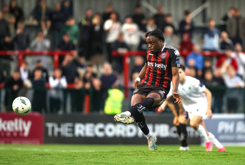 Jonathan Afolabi scores a penalty for Bohemians in their SSE Airtricity League Premier Division match against UCD at Dalymount Park. Photograph: Bryan Keane/Inpho