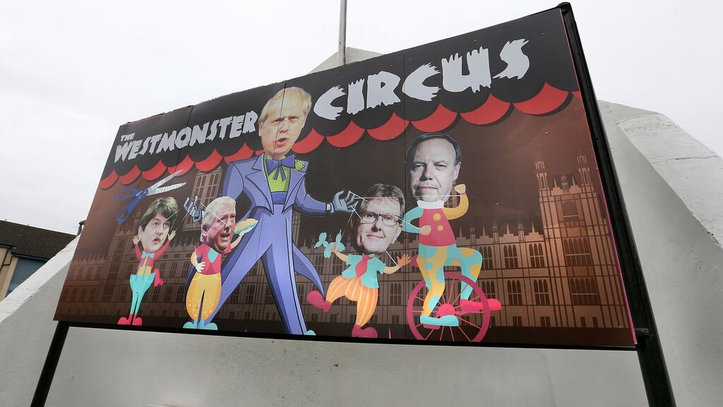 An image on the back of Free Derry Corner in the Bogside depicting UK prime minister Boris Johnson holding DUP puppets on strings. Photograph: Margaret McLaughlin
