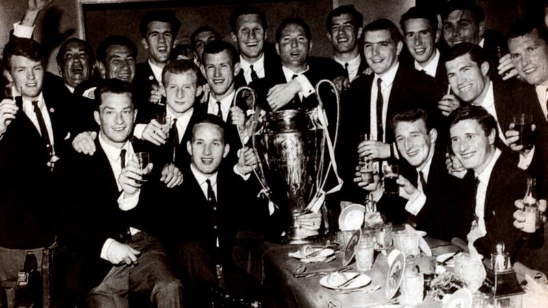 The 1967 Celtic team are pictured with the European Cup at their celebration banquet after the match. Photo: Getty Images