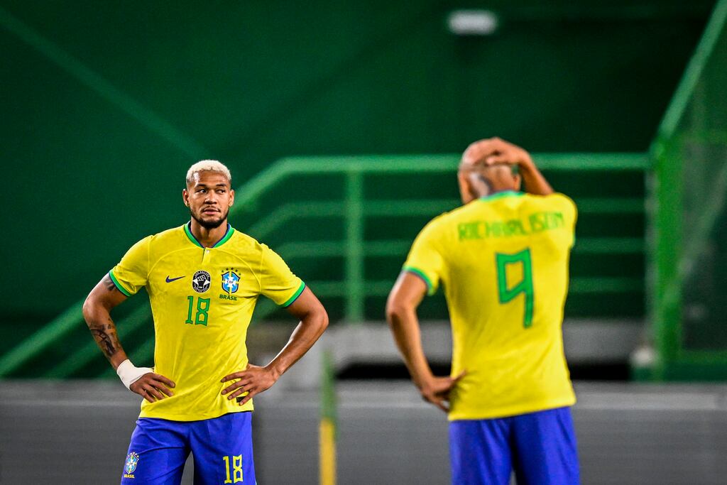 Brazil's midfielder Joelinton Cassio and Brazil's forward Richarlison (right) react after Senegal's forward Sadio Mane scored during the international friendly football match between Brazil and Senegal at the Jose Alvalade stadium in Lisbon. Photograph: Patricia del Melo Moreira/AFP via Getty Images