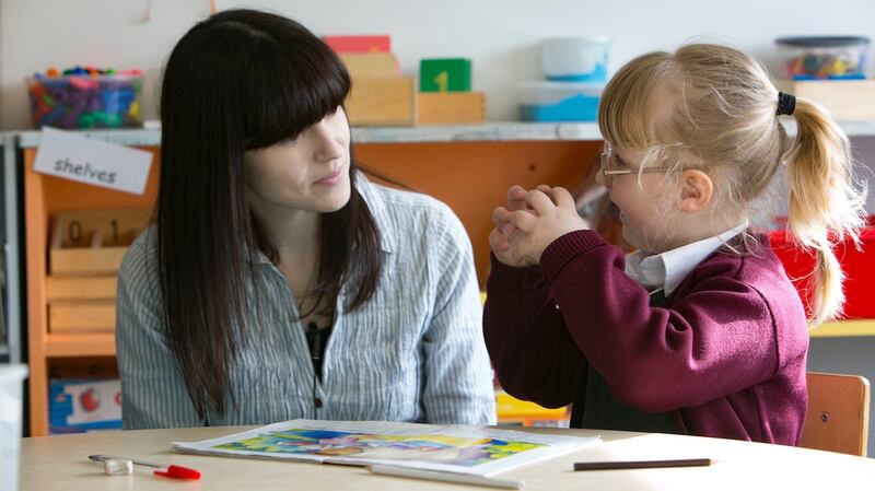 Teacher Sinead O’ Mahony  and student Maya Ambrus at the Mid-West School for the Deaf in Limerick. Photograph: Brian Gavin/Press 22