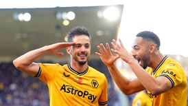 Wolves stun Tottenham with two stoppage-time strikes