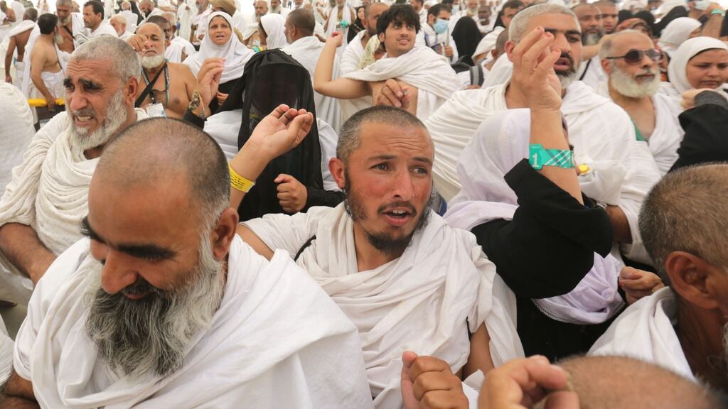 Pilgrims throw stones at a symbolic devil, hours after the stampede in Mina, near Mecca. Photograph: Amel Pain/EPA