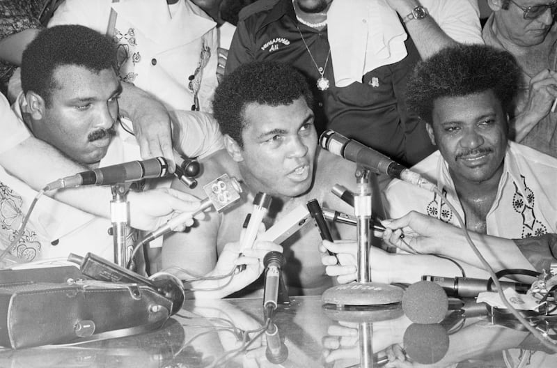 Muhammad Ali speaks to the media after defeating Joe Frazier in their 1975 fight. Photograph: Getty Images