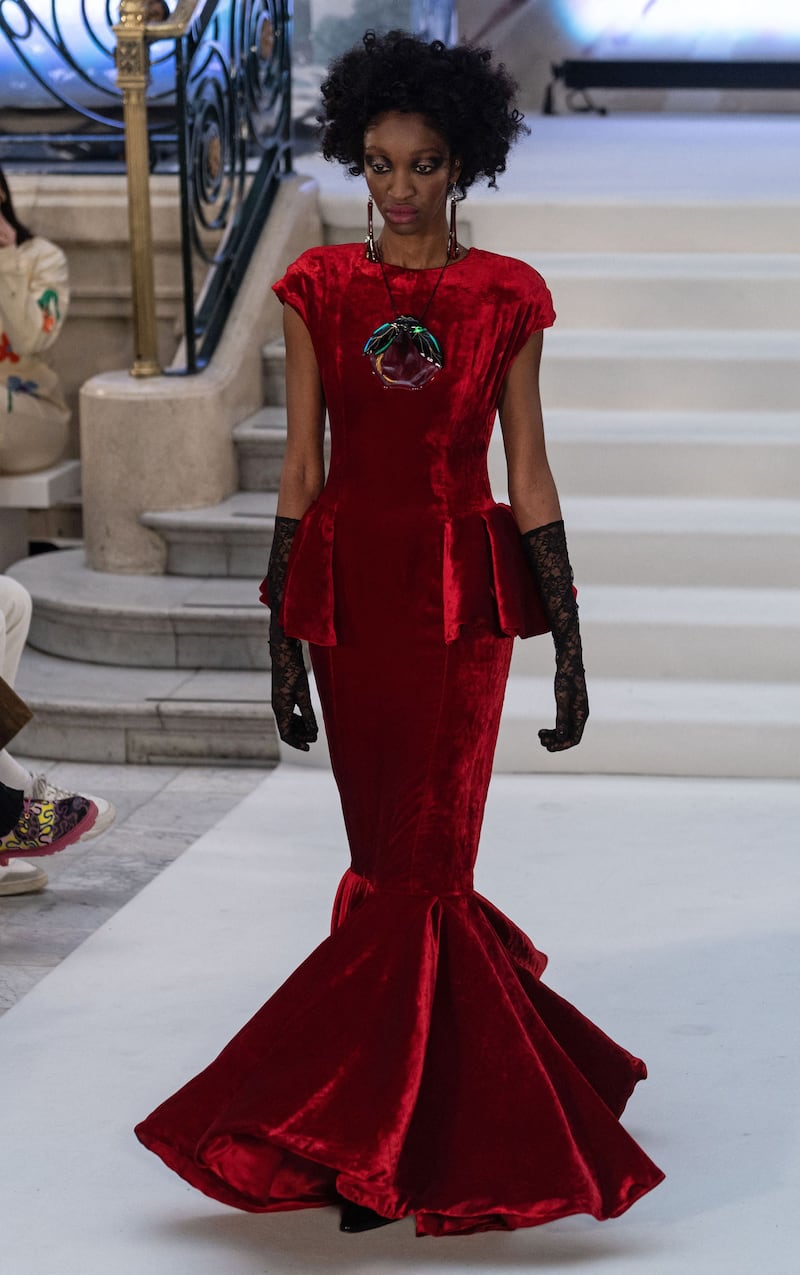 A model presents a creation for Irish-American designer Paul Costelloe during the catwalk show for his Autumn/Winter 2023 collection on the opening day of the London Fashion Week, in London, on February 17, 2023. - RESTRICTED TO EDITORIAL USE (Photo by Niklas HALLE'N / AFP) / RESTRICTED TO EDITORIAL USE (Photo by NIKLAS HALLE'N/AFP via Getty Images)