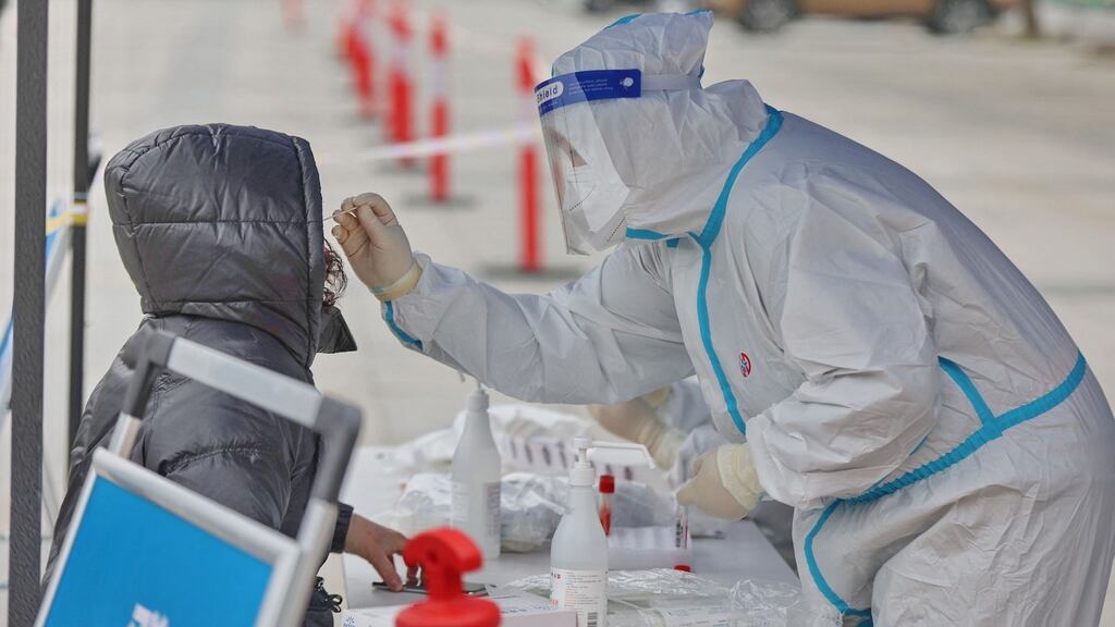 Another 8,250 PCR-confirmed cases of Covid-19 have been  reported in the State over the past few days. File photograph: STR/AFP via Getty Images