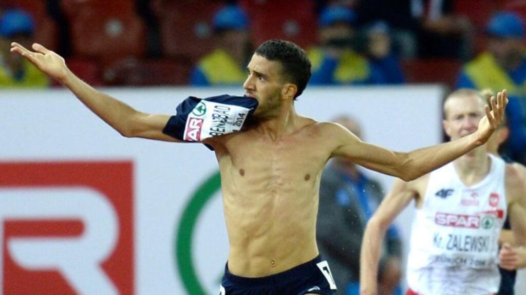 France’s Mahiedine Mekhissi-Benabbad takes his jersey off as he approaches the finish line in the men’s 3’000m steeplechase final of the European Athletics Championships in the Letzigrund Stadium in Zurich, Switzerland. Photograph: EPA