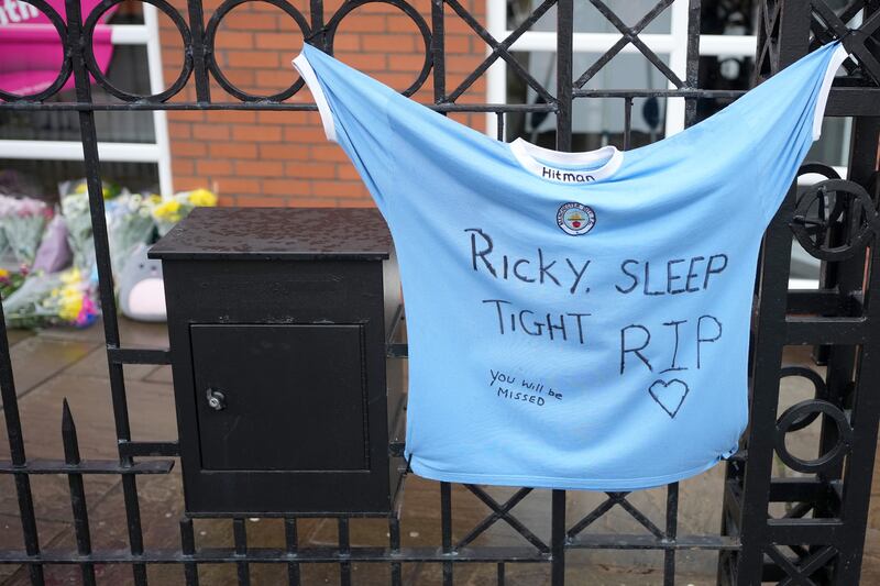A Manchester City football shirt in tribute to boxer Ricky Hatton adorns the fence outside Energie Fitness Gym. Photograph: Christopher Furlong/Getty