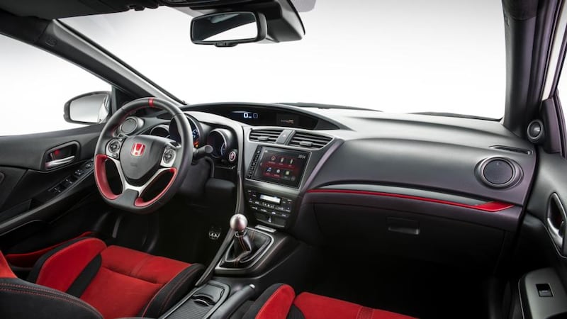 Interior gets Alcantara seats and a ’+R’ button to make everything go faster.