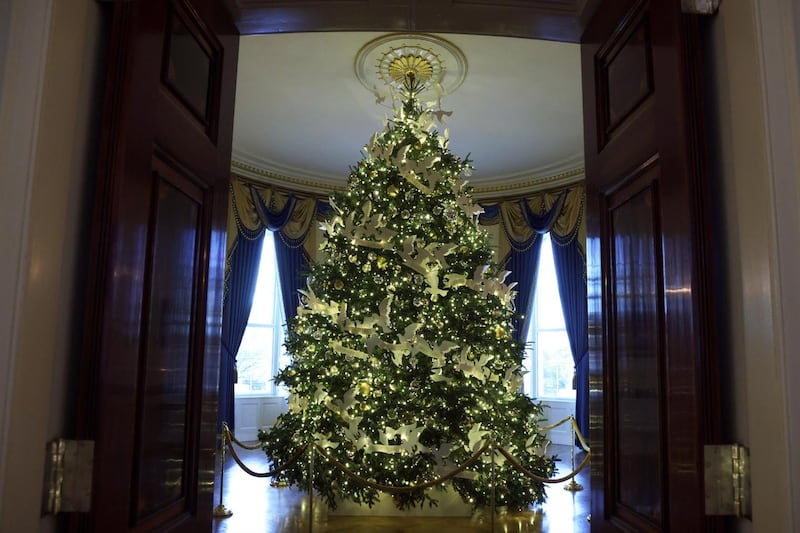 White House Christmas: the official White House Christmas tree in the Blue Room. Photograph: Alex Wong/Getty