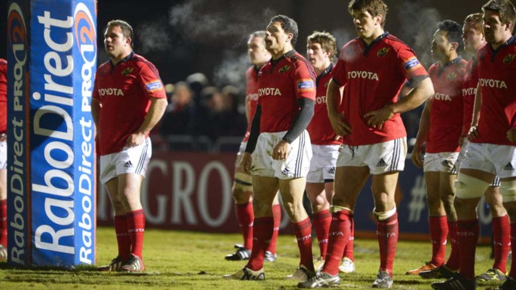 Dejected Munster players after conceding the final try against Glasgow in their Pro 12 clash last Friday night. They need to lift themselves for their clash against Harlequins.