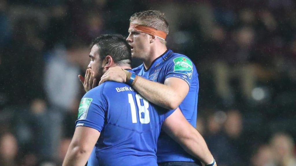 Leinster’s Martin Moore is congratulated by Jamie Heaslip.
