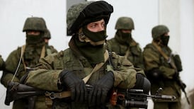 US warns Moscow of ‘huge price’ to pay as Russians spread out across Crimea