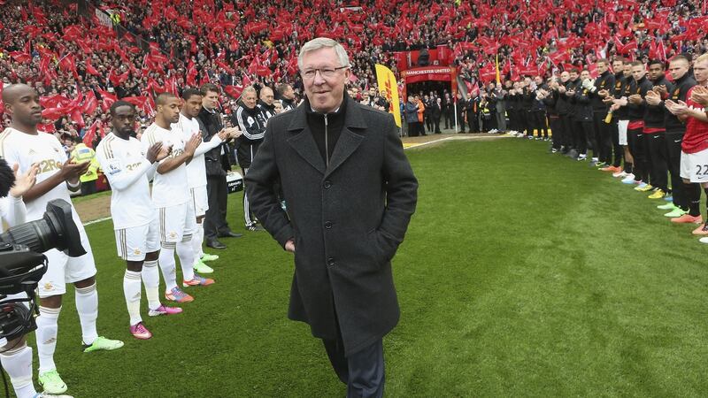 Alex Ferguson is given a guard of honour by both teams ahead of the Premier League match between Manchester United against Swansea in May 2013, his final game in charge at Old Trafford. Photograph: John Peters/Manchester United via Getty Images