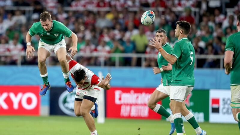 Jack Carty rises above Ryoto Nakamura to catch. Photo: Dan Sheridan/Inpho