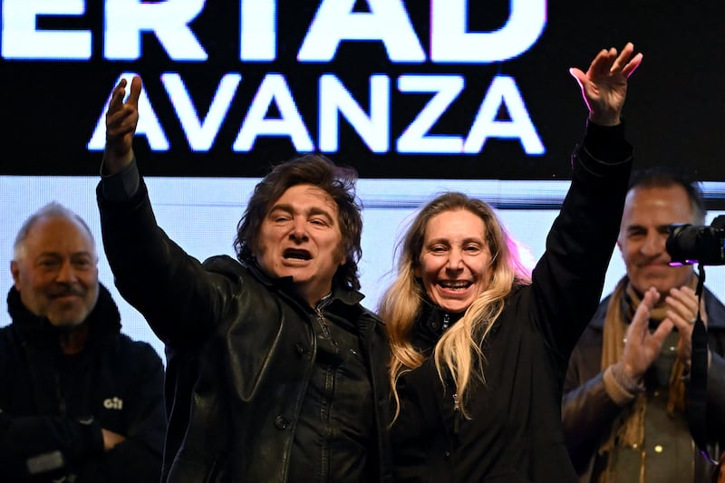 Argentina's president Javier Milei with his sister, secretary general of the presidency Karina Milei, gesture during the closing rally of the La Libertad Avanza political party for the provincial election in Moreno, Buenos Aires province, Argentina, on September 3rd. Photograph: Luis Robayo/AFP/Getty