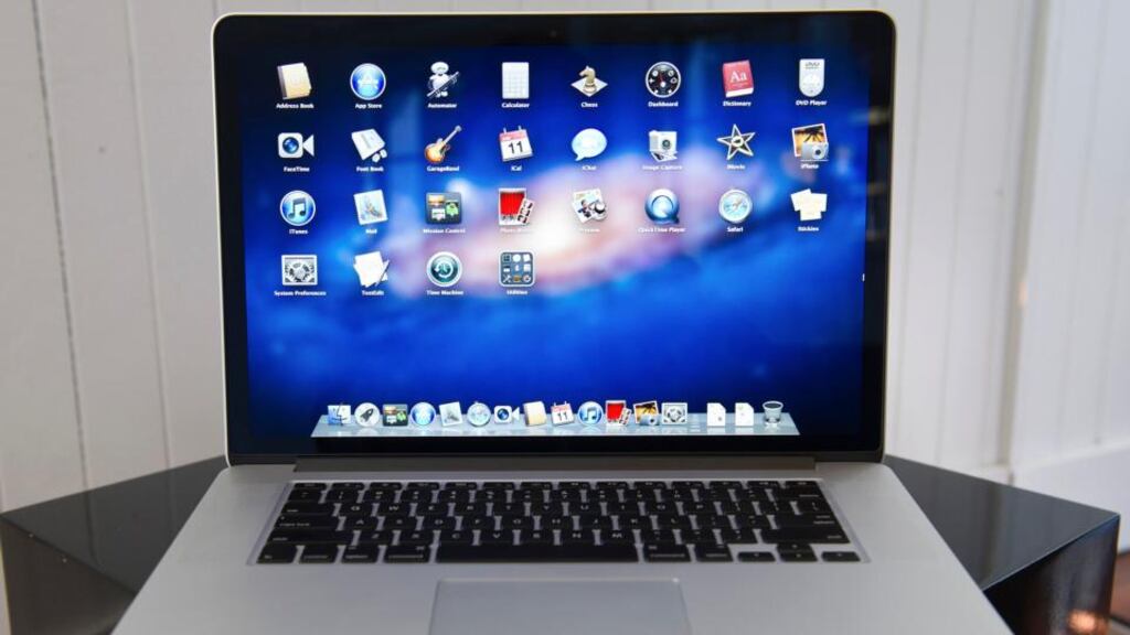 Apple is planning to bring over its Touch ID fingerprint technology from the iPhone to the new MacBook Pro line.