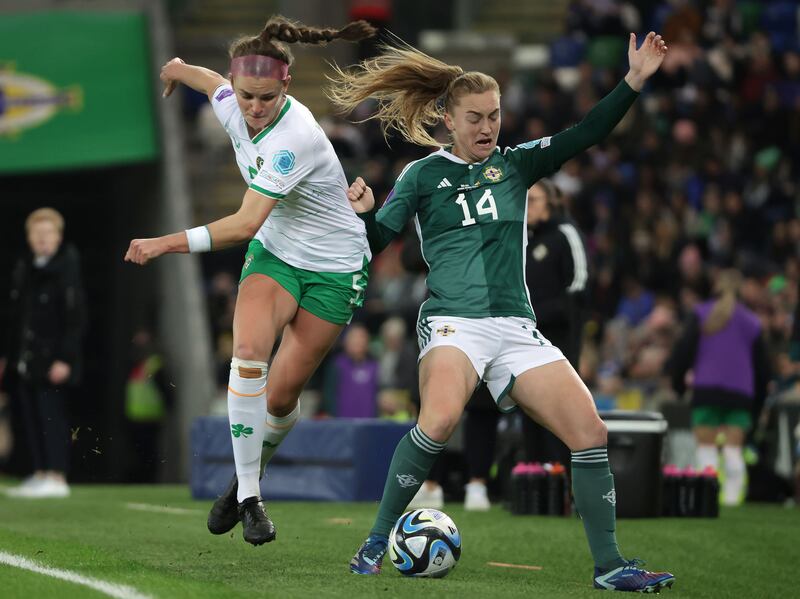 Northern Ireland’s Lauren Wade with Republic of Ireland’s Caitlin Hayes during their Women's Nations League match at Windsor Park on Tuesday. Photograph: William Cherry/Presseye/Inpho