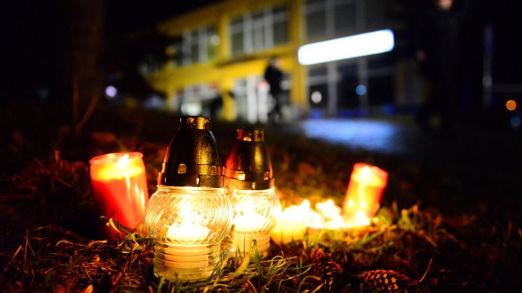 Candles near the site of a shooting at a restaurant in the city of Uhersky Brod, Czech Republic. Authorities in the town said the local man who fired about 25 shots had acted alone, was a “crazed individual” and had no terrorist motive. Photograph: STR/EPA