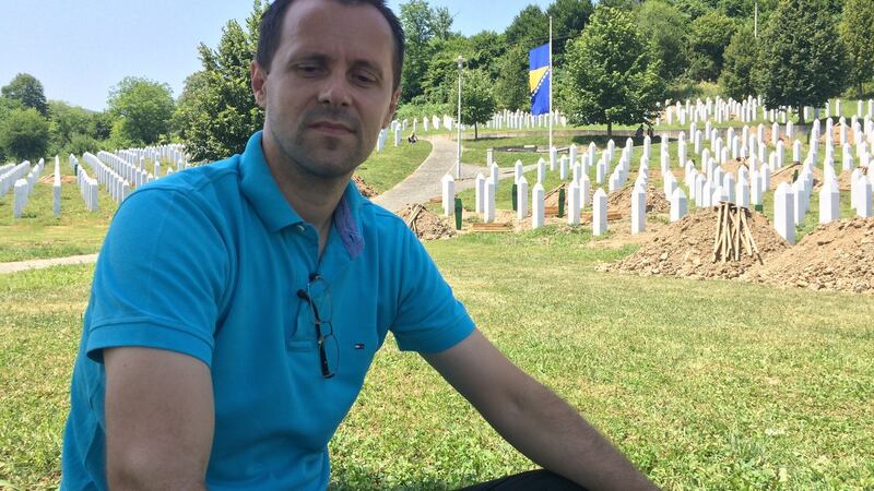 Nedzad Avdic, a survivor of the 1995 Srebrenica genocide, pictured in July 2017 at the Potocari cemetery where about 8,000 Bosnian Muslim victims of the massacre are buried. Photograph: Daniel McLaughlin